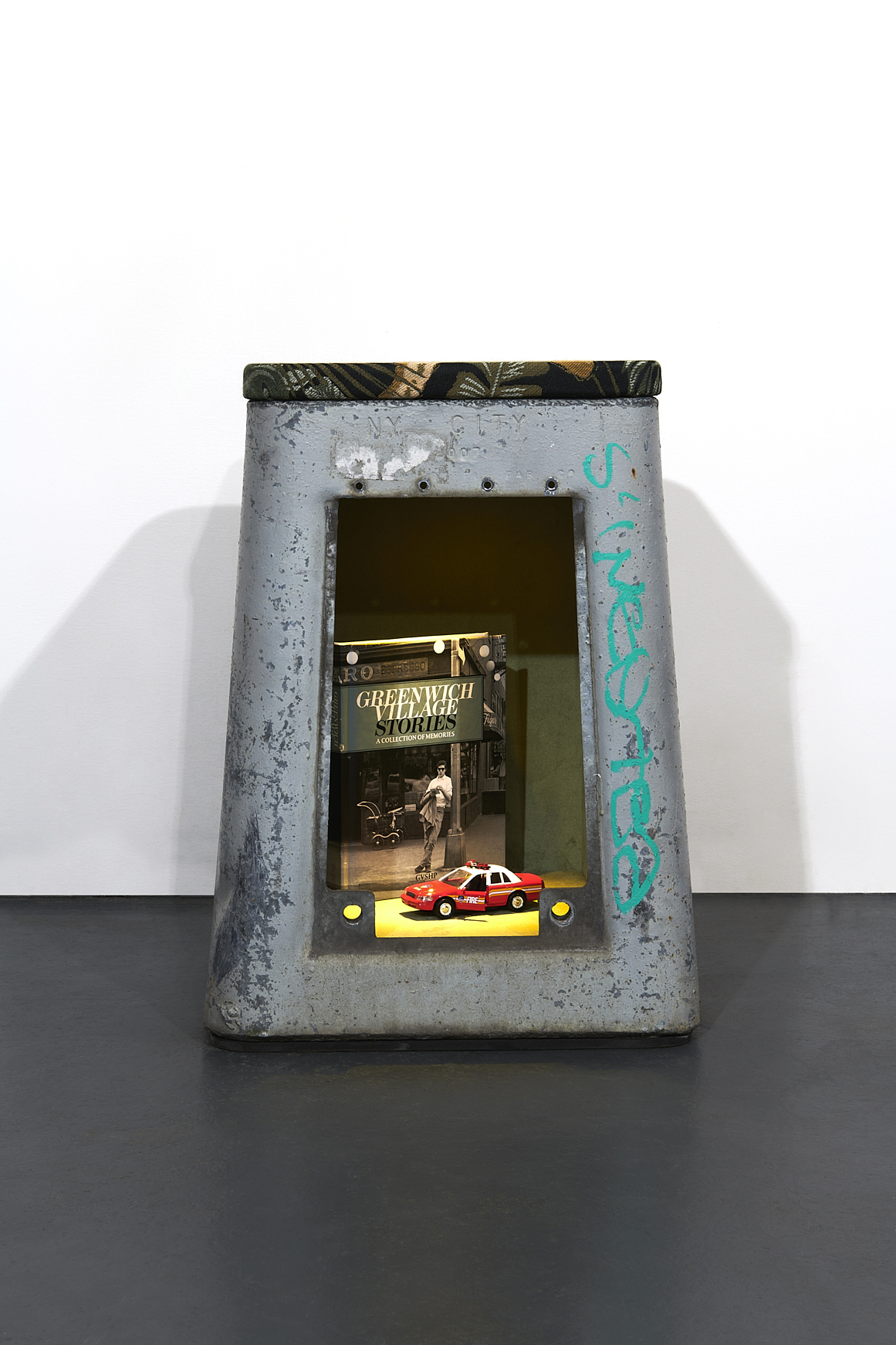 a toy car in a box. Carlo Sampietro