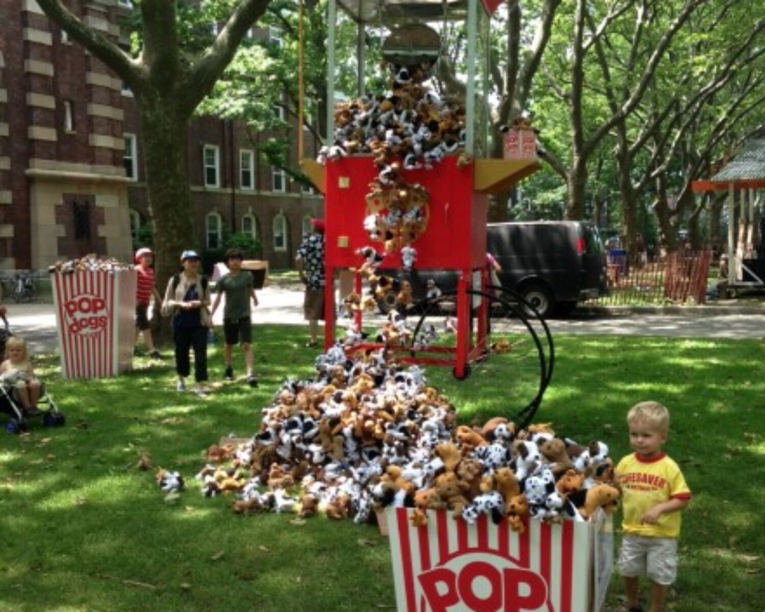 a large red and white cart with popcorn scattered on it. Carlo Sampietro