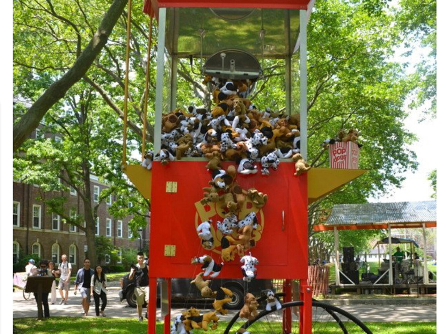 a large red and white cart with popcorn scattered on it. Carlo Sampietro