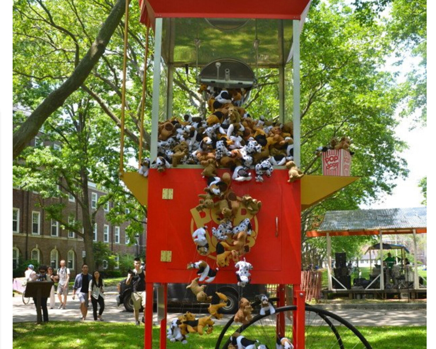 a large red and white cart with popcorn scattered on it. Carlo Sampietro
