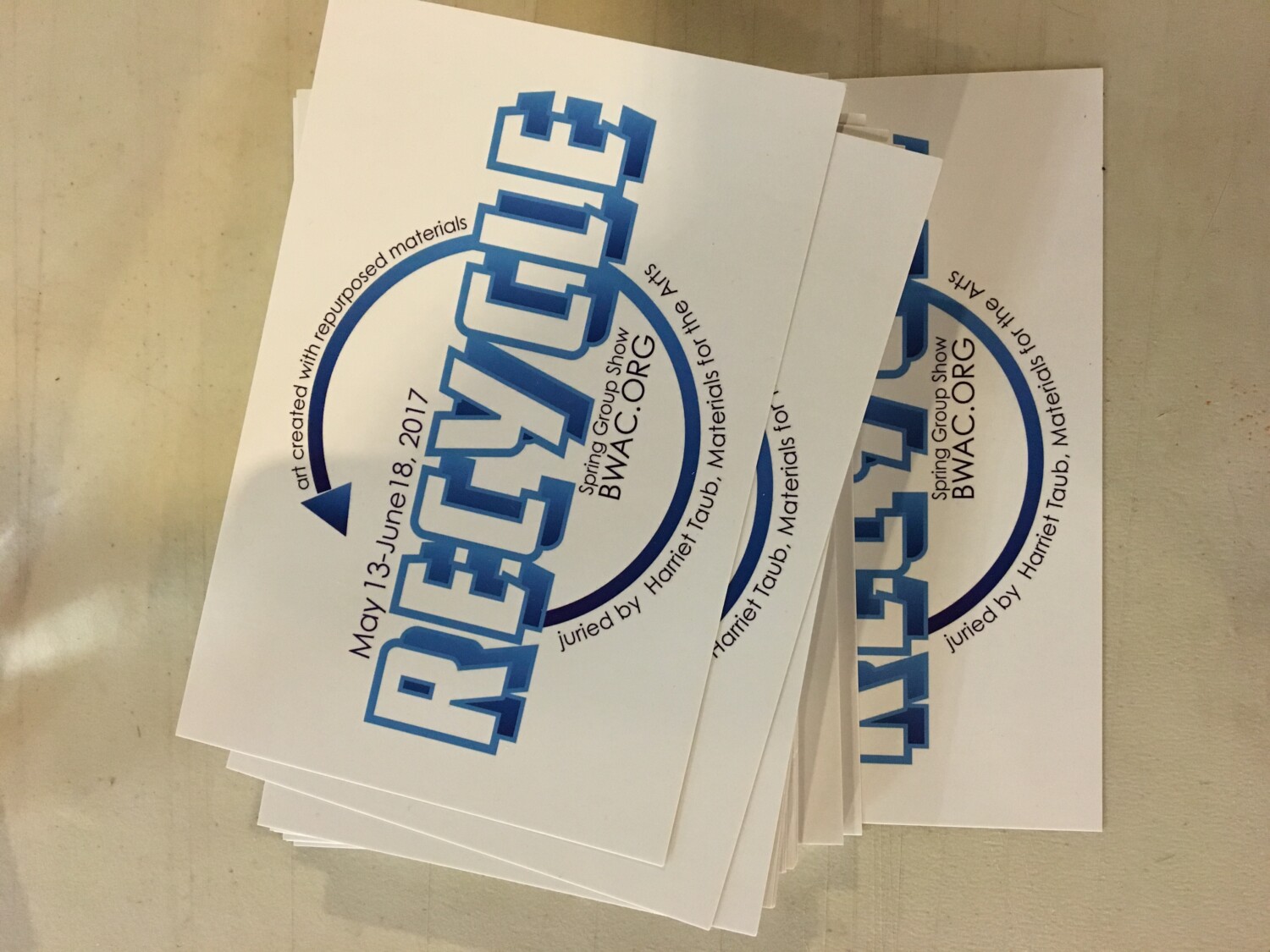 a stack of white and blue paper. Carlo Sampietro