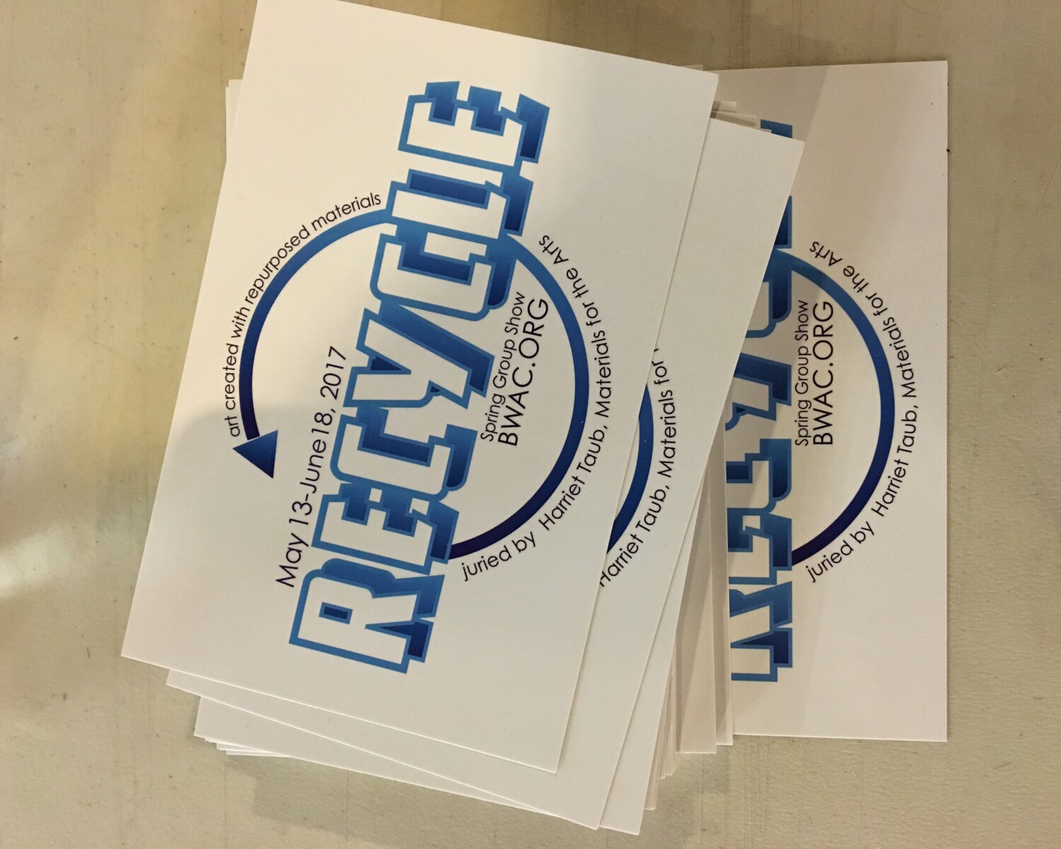 a stack of white and blue paper. Carlo Sampietro