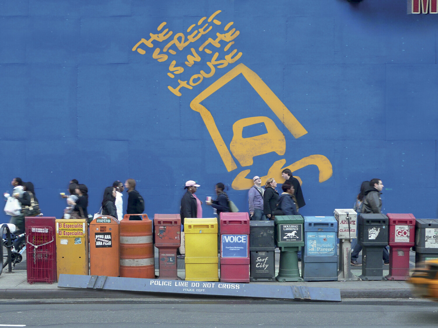 a group of people standing in front of a wall with a sign on it. Carlo Sampietro