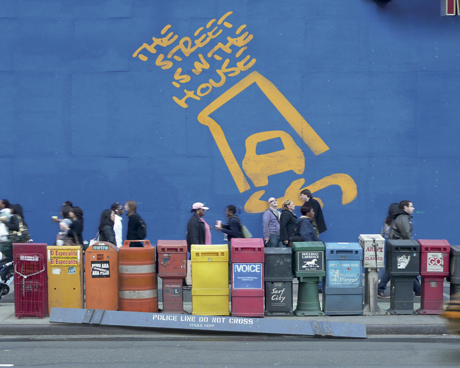 a group of people standing in front of a wall with a sign on it. Carlo Sampietro