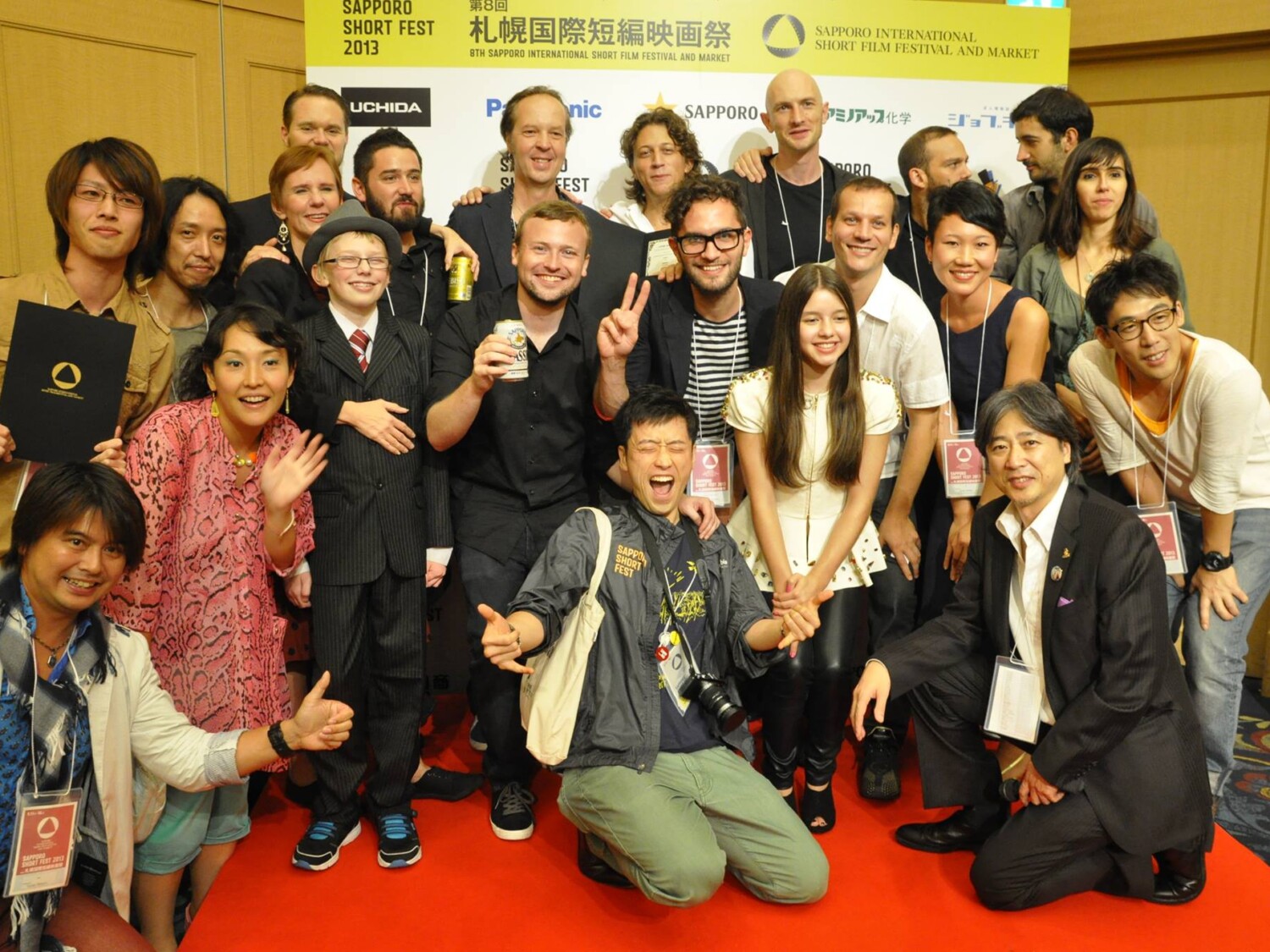 a group of people posing for a photo. Carlo Sampietro