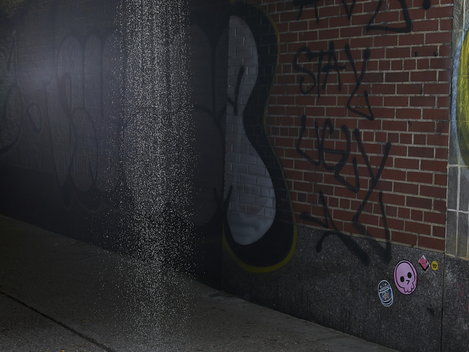 a spray paint on a wall. Carlo Sampietro