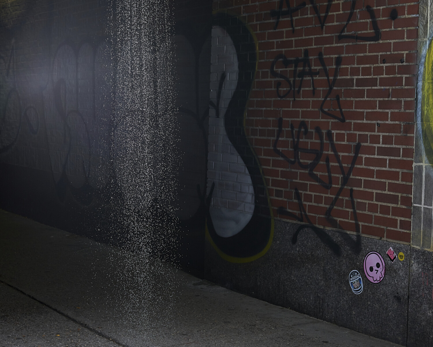 a spray paint on a wall. Carlo Sampietro