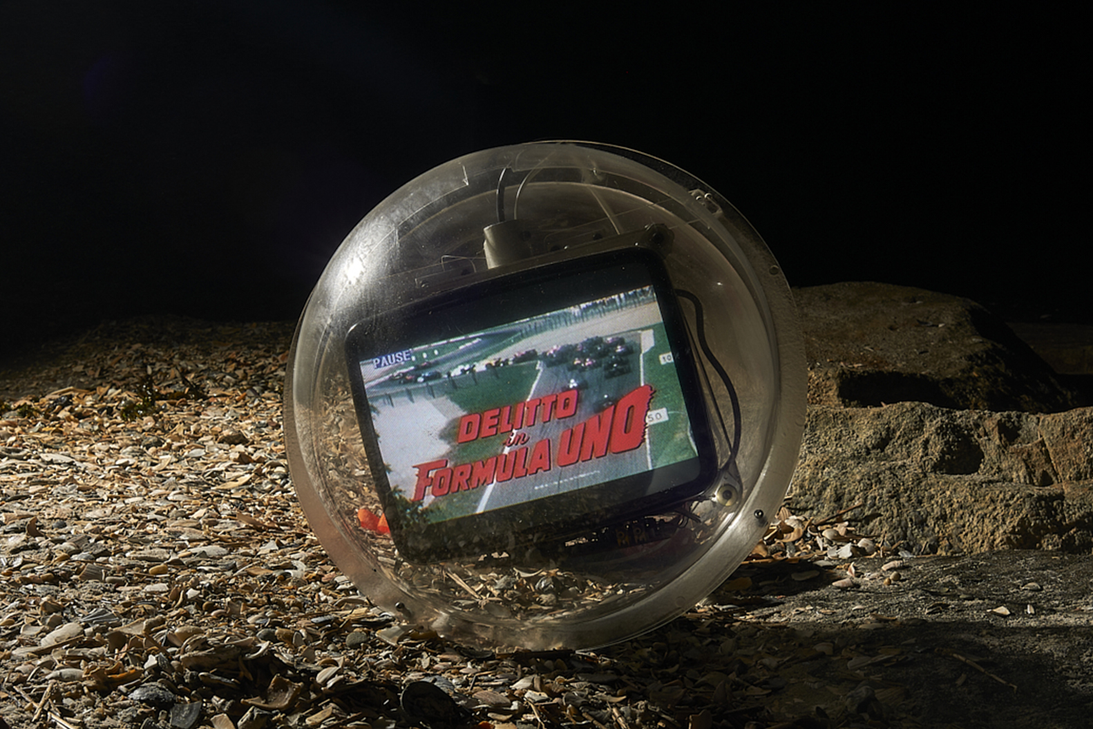a television in a sphere. Carlo Sampietro
